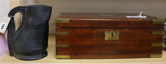 A Regency mahogany brass-bound writing slope and a leather black jack, W 44.5cm D 24.5cm